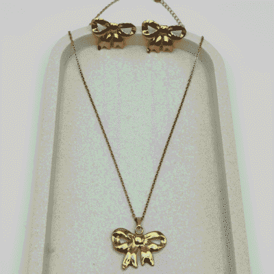 Charming Golden Bow Pendant & Earring Set